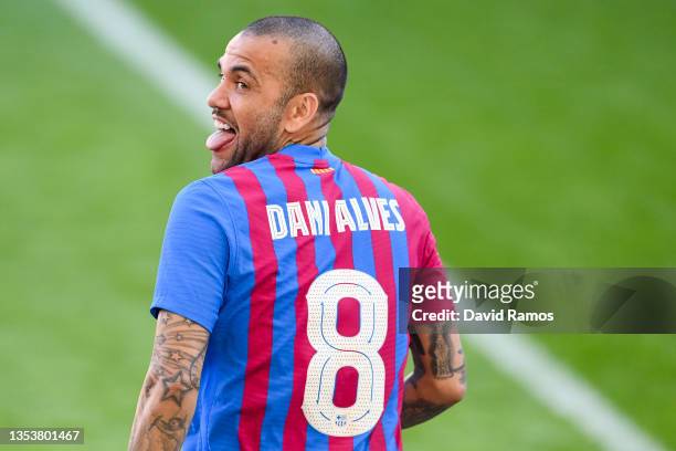 Dani Alves reacts as he is presented as a FC Barcelona player at Camp Nou on November 17, 2021 in Barcelona, Spain.