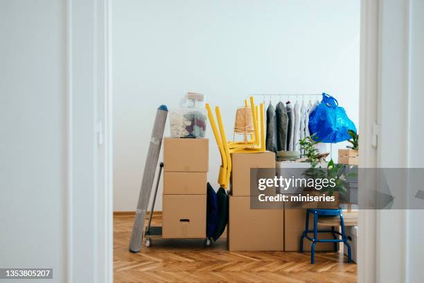 interior with packed cardboard boxes and other stuff ready for relocation - possession stock pictures, royalty-free photos & images