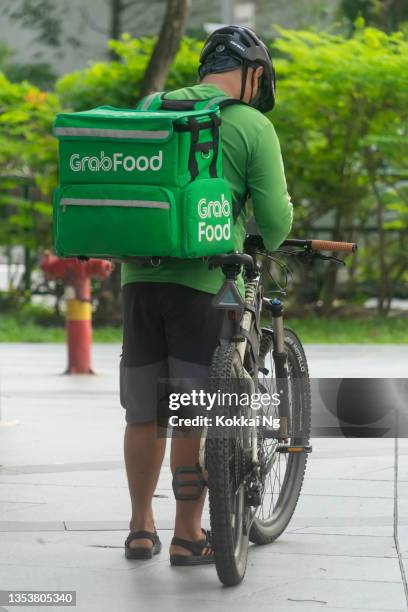 Grab Food Loading Grab Food Rider Photos and Premium High Res Pictures - Getty Images