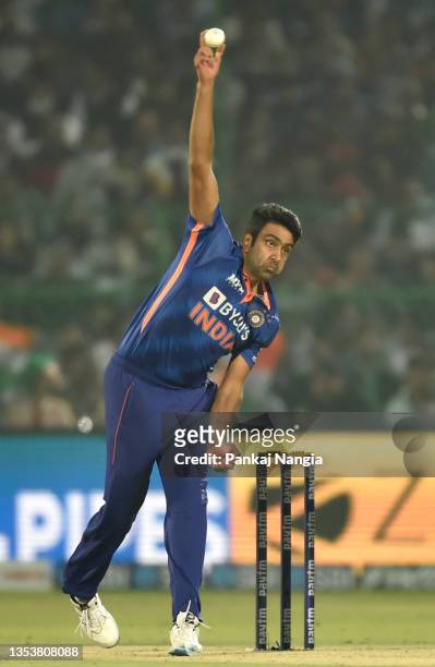 Ravichandran Ashwin of India in bowling action during the T20 International Match between India and New Zealand at Sawai Mansingh Stadium on November...