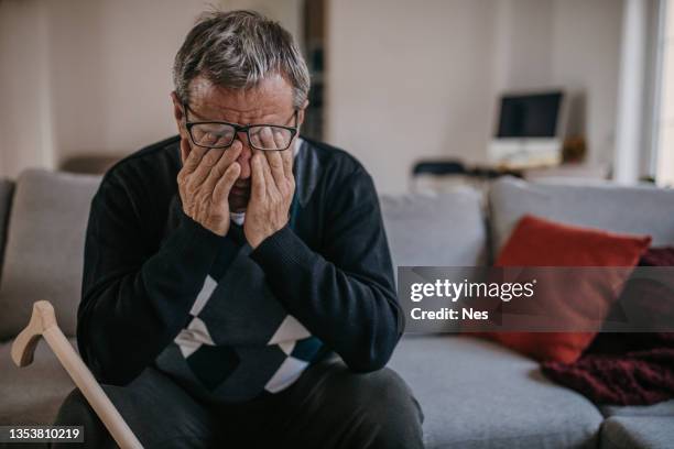 tired human eyes - crying man stock pictures, royalty-free photos & images