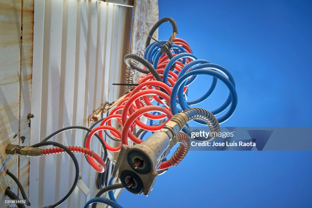 Close up of power cables connecting cab and trailer
