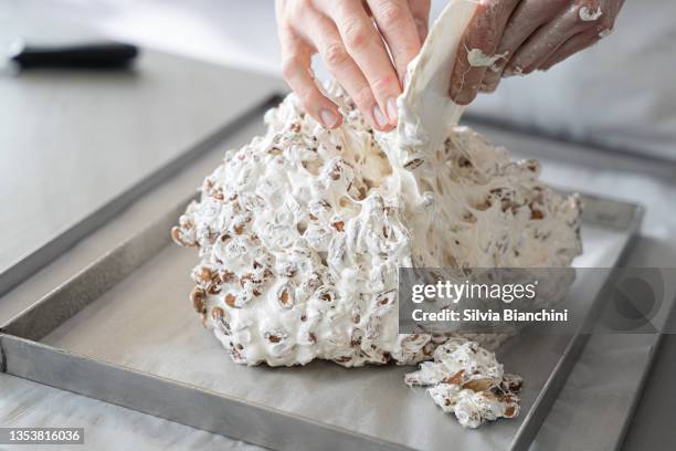 baker praparing nougat - nougat stock pictures, royalty-free photos & images