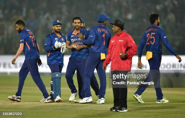 Deepak Chahar of India celebrates the wicket of Martin Guptill of New Zealand with teammates during the T20 International Match between India and New...