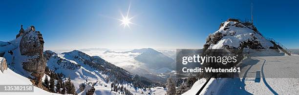 south germany, upper bavaria, bayrischzell, view of small church and viewing platform from wendelstein mountain with snowy alps in background - kaiser fotografías e imágenes de stock