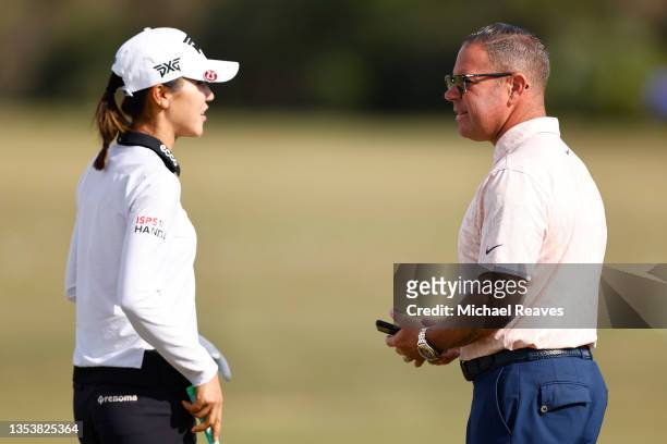 Lydia Ko of New Zealand talks with coach Sean Foley during a practice round prior to the CME Group Tour Championship at Tiburon Golf Club on November...