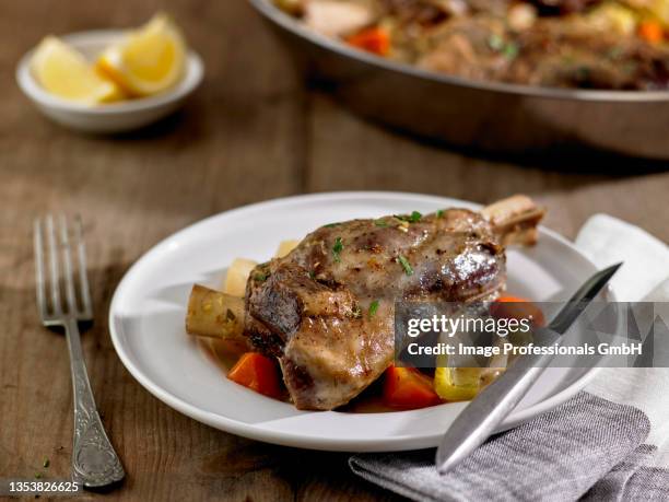 braised lamb shanks with lemon - leg of lamb stock pictures, royalty-free photos & images