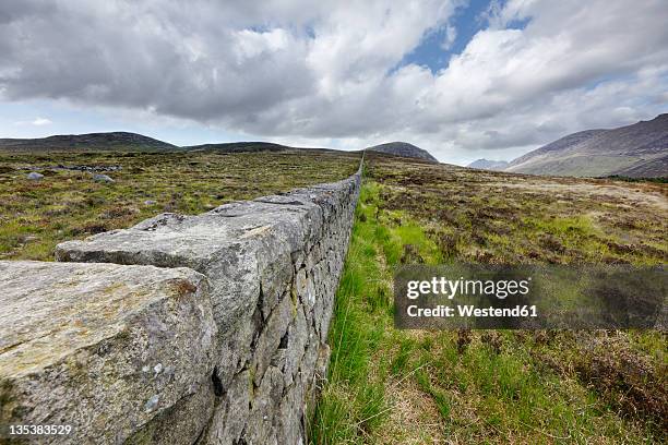 united kingdom, northern ireland, county down, mourne mountains, view of mourne wall - county down stock pictures, royalty-free photos & images