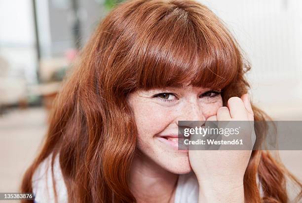 germany, berlin, close up of young woman, smiling, portrait - bangs stock pictures, royalty-free photos & images