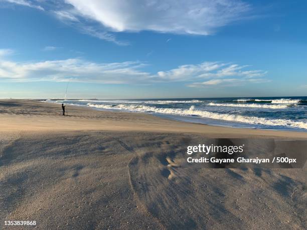 scenic view of beach against sky,figueira da foz,portugal - gayane stock pictures, royalty-free photos & images