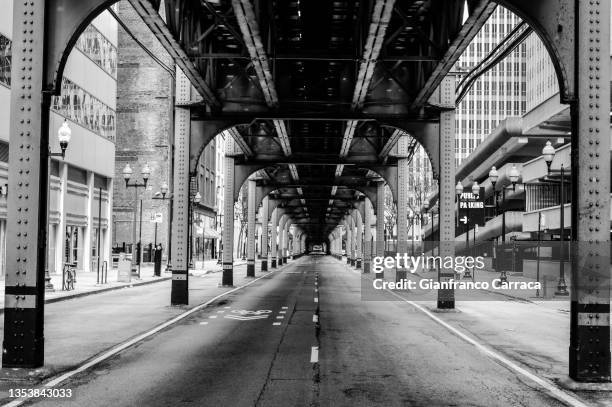 black and white tunnel along the streets of chicago - chicago black and white stock pictures, royalty-free photos & images