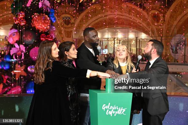 Helene Sy, Leïla Bekhti, Omar Sy, Louane and Alexandre Liot attend "1 3 Noel!" : Galeries Lafayette Christmas decorations inauguration at Galeries...