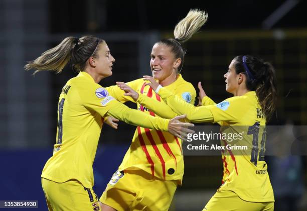 Alexia Putellas of Barcelona celebrates scoring the first goal from the penalty spot with Fridolina Rolfö and Aitana Bonmati during the UEFA Women's...