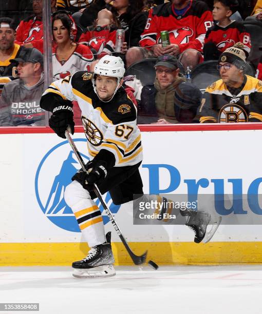 Jakub Zboril of the Boston Bruins passes the puck in the second period against the New Jersey Devils at Prudential Center on November 13, 2021 in...