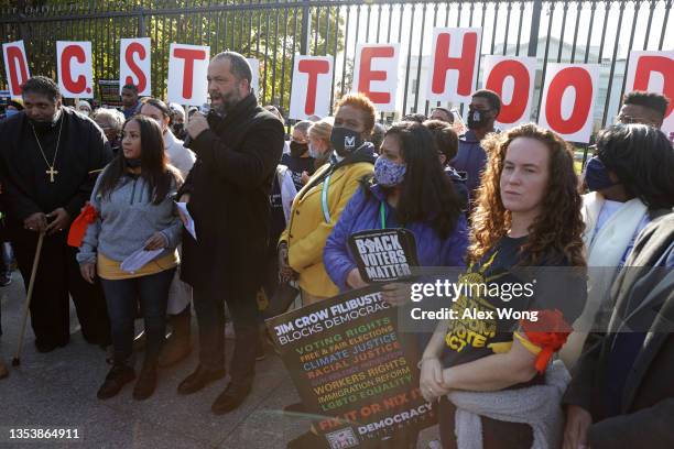 People for the American Way President Ben Jealous speaks as Rev. William Barber II of the Poor People's Campaign listens during a voting rights...