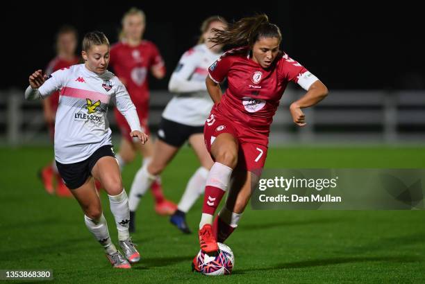 Abi Harrison of Bristol City makes a break past Sophie O'Rourke of Lewes during the FA Women's Continental Tyres League Cup match between Bristol...