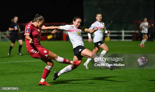 Abi Harrison of Bristol City takes a shot at goal under pressure from Rhian Cleverly of Lewes during the FA Women's Continental Tyres League Cup...