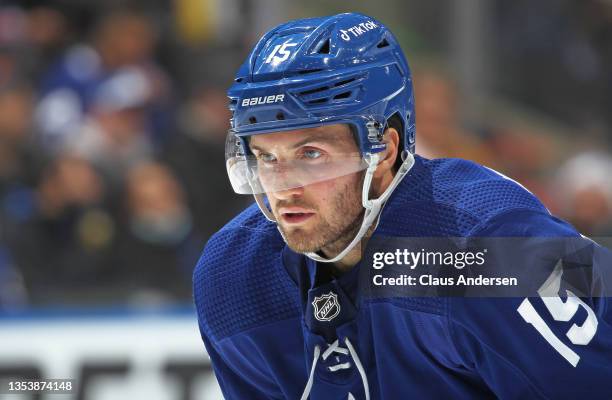 Alexander Kerfoot of the Toronto Maple Leafs gets set for a faceoff against the Nashville Predators during an NHL game at Scotiabank Arena on...