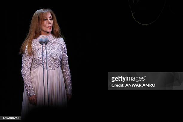Lebanese diva Fairuz performs at Lebanon's new state-of-art Platea theatre in Sahel Alma north of the capital Beirut on December 9, 2011. The...