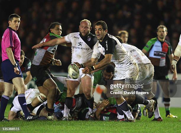 Gregory Lamboley of Toulouse passes the ball during the Heineken Cup match between Harlequins and Toulouse at Twickenham Stoop on December 9, 2011 in...