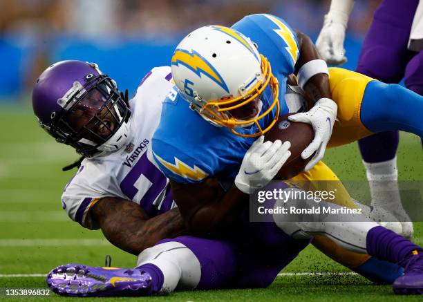 Joshua Palmer of the Los Angeles Chargers and Bashaud Breeland of the Minnesota Vikings at SoFi Stadium on November 14, 2021 in Inglewood, California.