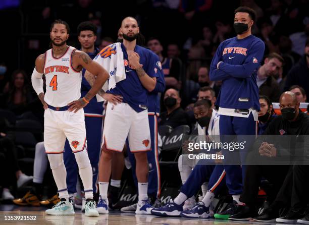 Derrick Rose of the New York Knicks and teammates on the bench Evan Fournier and Kevin Knox II react to the loss to the Orlando Magic at Madison...