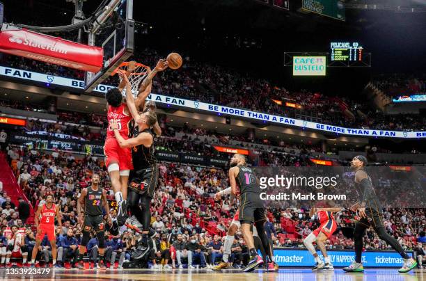 Udonis Haslem of the Miami Heat blocks the shot of Trey Murphy III of the New Orleans Pelicans during the second half at FTX Arena on November 17,...