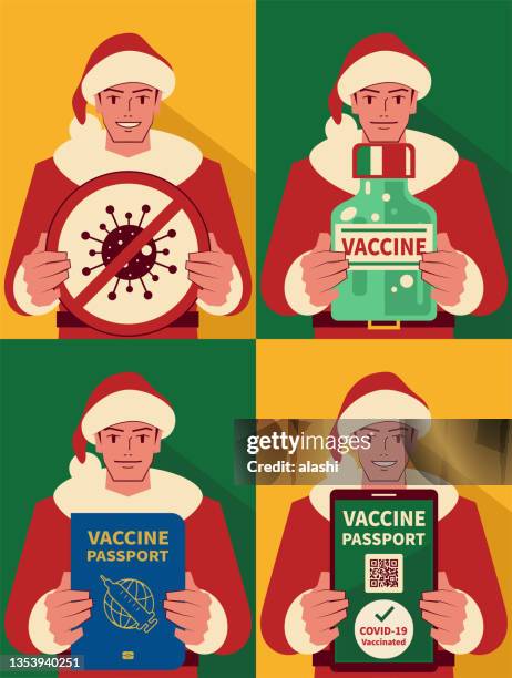 bildbanksillustrationer, clip art samt tecknat material och ikoner med happy handsome young men dressed in a santa claus suit showing the covid-safe christmas concept - corona warn app