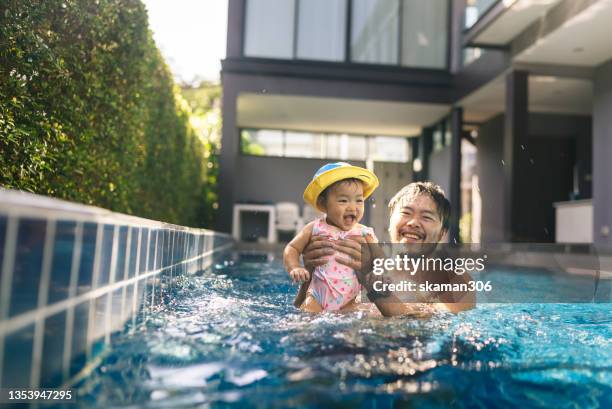 happy summer day  with swimming pool - family weekend activities stock pictures, royalty-free photos & images