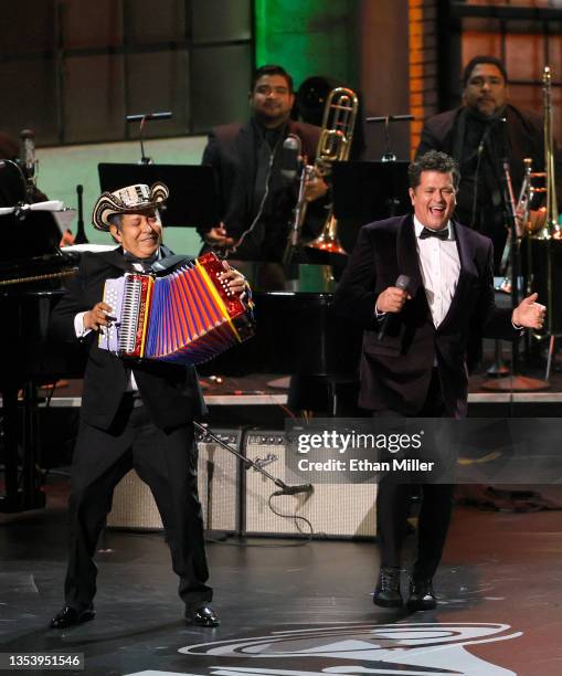 Egidio Cuadrado and Carlos Vives perform onstage during The Latin Recording Academy's 2021 Person of the Year Gala honoring Ruben Blades at Michelob...