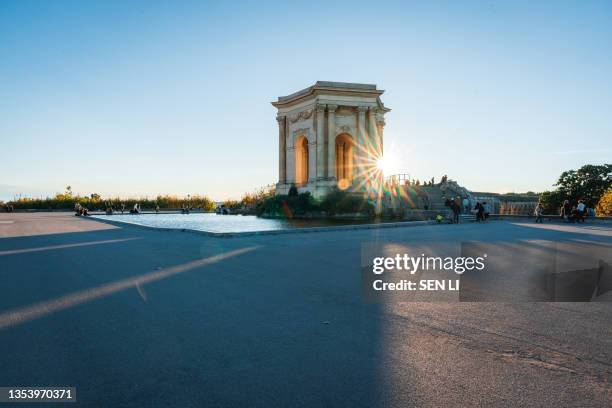 sunset at the promenade du peyrou, château d’eau du peyrou at montpellier, france - montpellier stock pictures, royalty-free photos & images