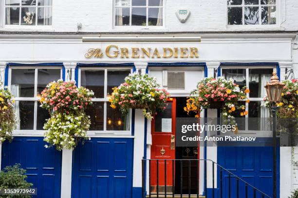 the grenadier is pub in belgravia, knightsbridge, london attended by celebrities. - phatianov stock pictures, royalty-free photos & images