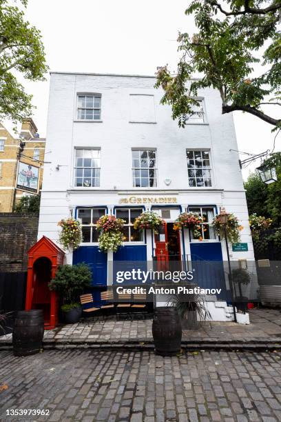 the grenadier is pub in belgravia, knightsbridge, london attended by celebrities. - phatianov stock pictures, royalty-free photos & images