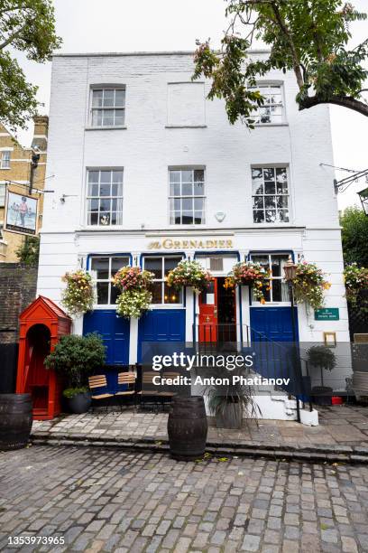 the grenadier is pub in belgravia, knightsbridge, london attended by celebrities. - phatianov stock pictures, royalty-free photos & images