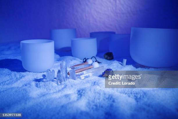 sound healing ritual instruments and bowls in a health spa salt cave - gong stock pictures, royalty-free photos & images