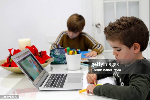 siblings doing homework with laptop - 9 hand drawn patterns stock pictures, royalty-free photos & images