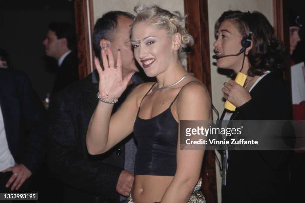American singer Gwen Stefani, wearing a black crop top, attends the 5th Annual Race to Erase MS Gala, held at the Century Plaza Hotel in Century...