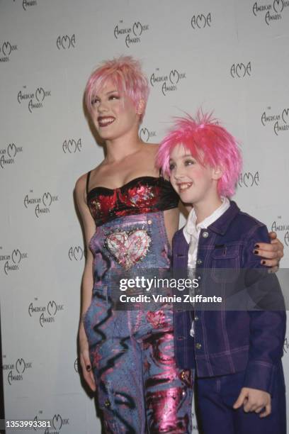 American singer Pink and dancer 'Little Pink' in the press room of the 28th Annual American Music Awards, held at the Shrine Auditorium in Los...