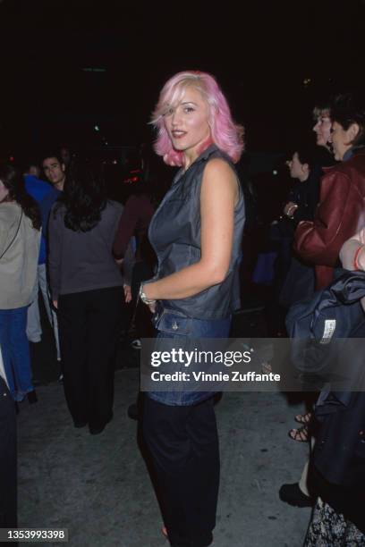 American singer Gwen Stefani, with pink hair, attends the PETA Party of the Century and Humanitarian Awards, held at Paramount Studios in Los...