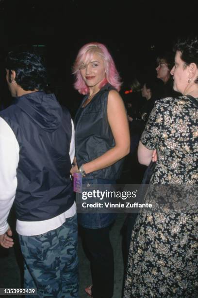 American singer Gwen Stefani, with pink hair, attends the PETA Party of the Century and Humanitarian Awards, held at Paramount Studios in Los...