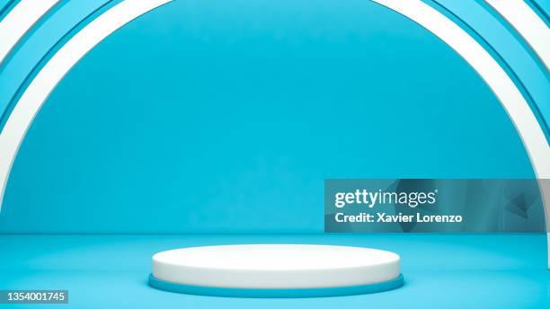 blue studio background with isolated podium for product presentation - winners podium imagens e fotografias de stock