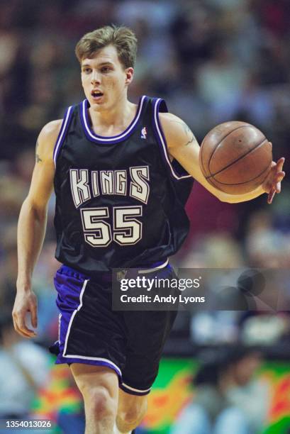 Jason Williams, Point Guard for the Sacramento Kings dribbles the basketball down court during the NBA Atlantic Division basketball game against the...