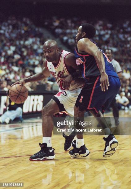 Tim Hardaway, Point Guard for the Miami Heat dribbles the basketball around Chris Childs of the New York Knicks during Game 5, Round 1 of the NBA...