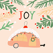 Christmas greeting card with travel trailer, lettering joy, christmas branches. Merry Christmas idea for greeting card, wall art, t shirt, printable apparels. Vector illustration.