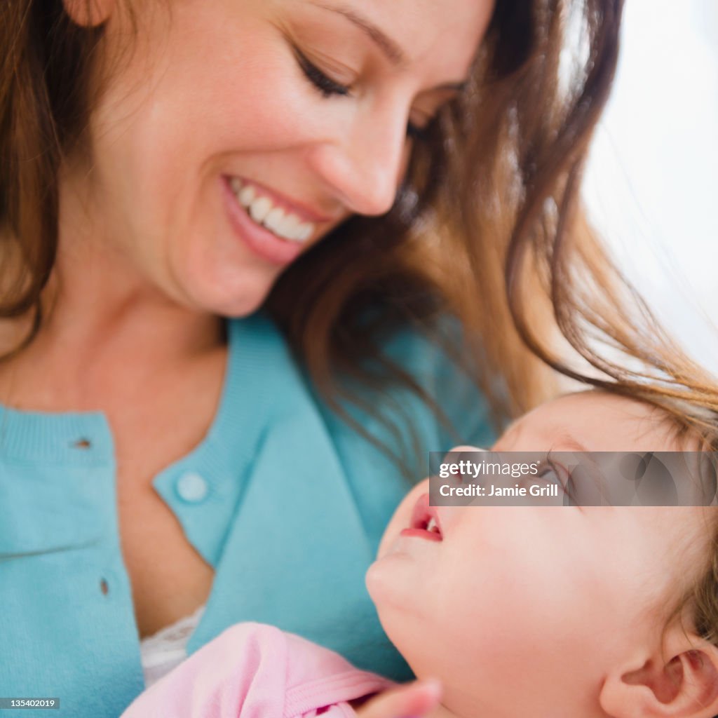 Mother and baby looking at each other