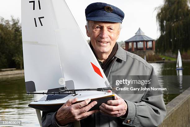 model boat owner proud of his craft - norman elder stock-fotos und bilder