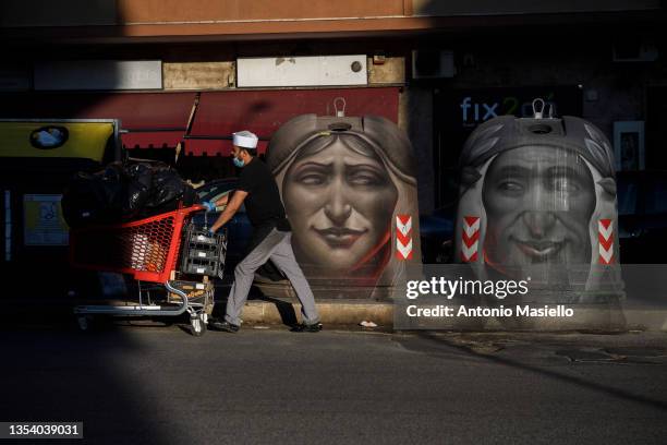 General view shows two glass recycling containers depicting Dante's songs from hell from the Divine Comedy, as part of the new GAU project promoted...