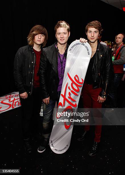 Jamie Fallese, Nash Overstreet, and Ryan Fallese of Hot Chelle Rae attend the Z100 & Reebok Classics Artist Gift Lounge at Z100's Jingle Ball 2011 at...