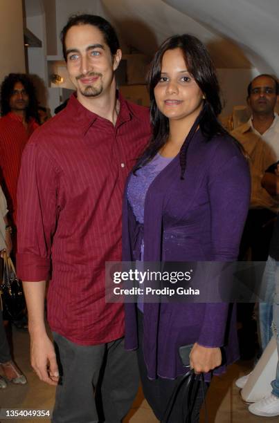 Adam Bedi and Nisha Bedi attend the launch of Bika Swimwear by Ambika Sanjana at Creo store on June 07,2012 in Mumbai, India.