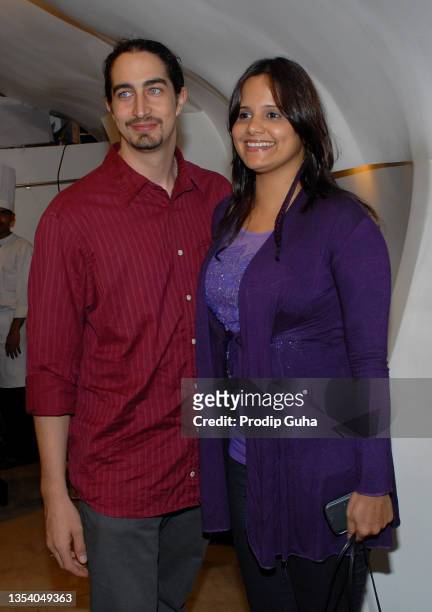 Adam Bedi and Nisha Bedi attend the launch of Bika Swimwear by Ambika Sanjana at Creo store on June 07,2012 in Mumbai, India.